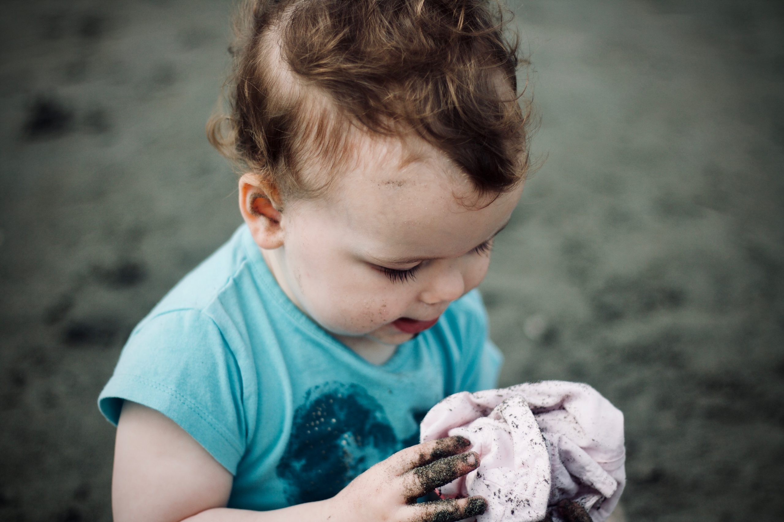 baby with dirty hands