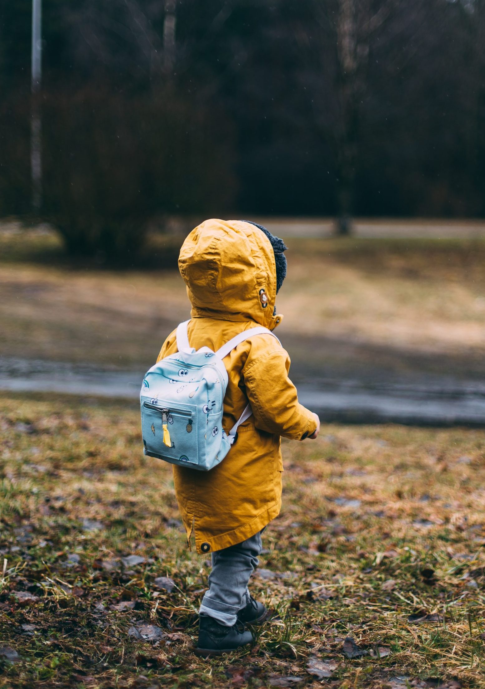 little kid in raincoat