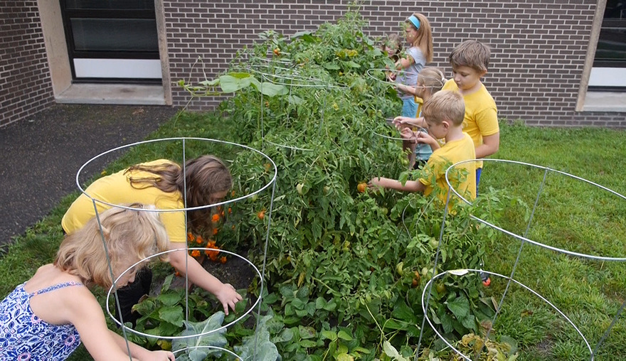 kids watering planter Lake Harriet